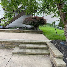 Brunswick-Residential-Pressure-Washing-Project-Featuring-House-Washing-Pool-Deck-Cleaning-Retaining-Wall-Cleaning-and-Concrete-Cleaning 0