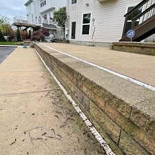 Brunswick-Residential-Pressure-Washing-Project-Featuring-House-Washing-Pool-Deck-Cleaning-Retaining-Wall-Cleaning-and-Concrete-Cleaning 2