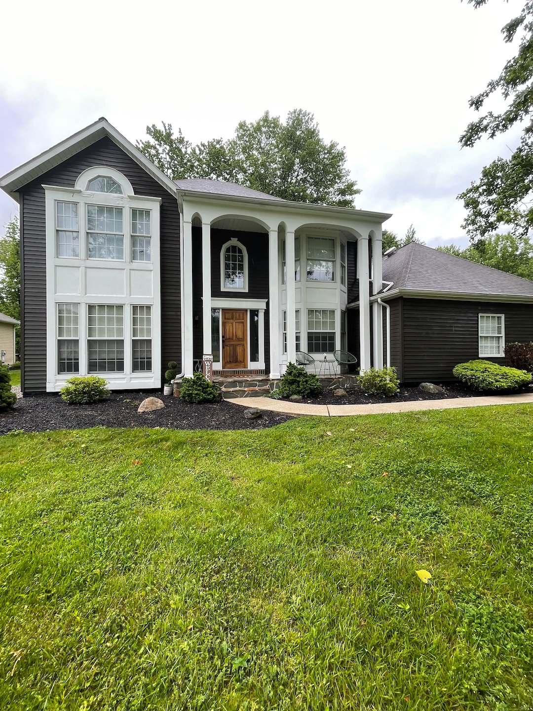 Elevate Your Home's Exterior with Residential Pressure Washing: A Guide to Protecting Painted Vinyl Siding in Westlake, OH