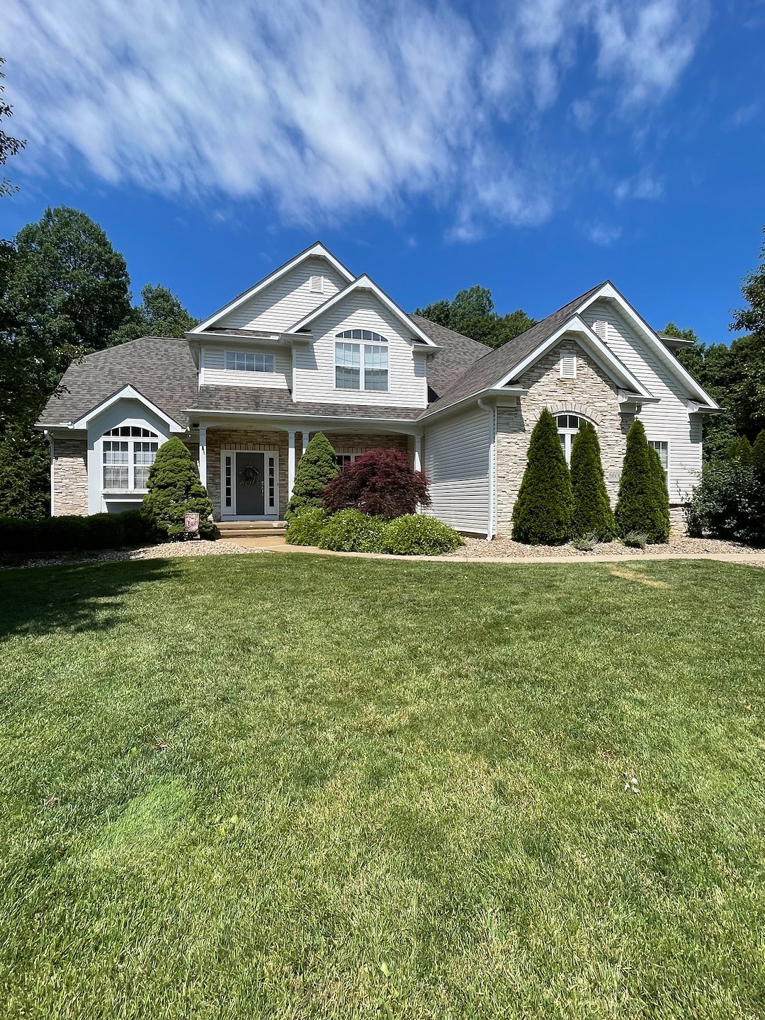 Painesville House Washing | Soft Washing | Residential Pressure Washing | Stamped Concrete Patio Cleaning