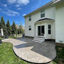 Painesville-House-Washing-Soft-Washing-Residential-Pressure-Washing-Stamped-Concrete-Patio-Cleaning 2