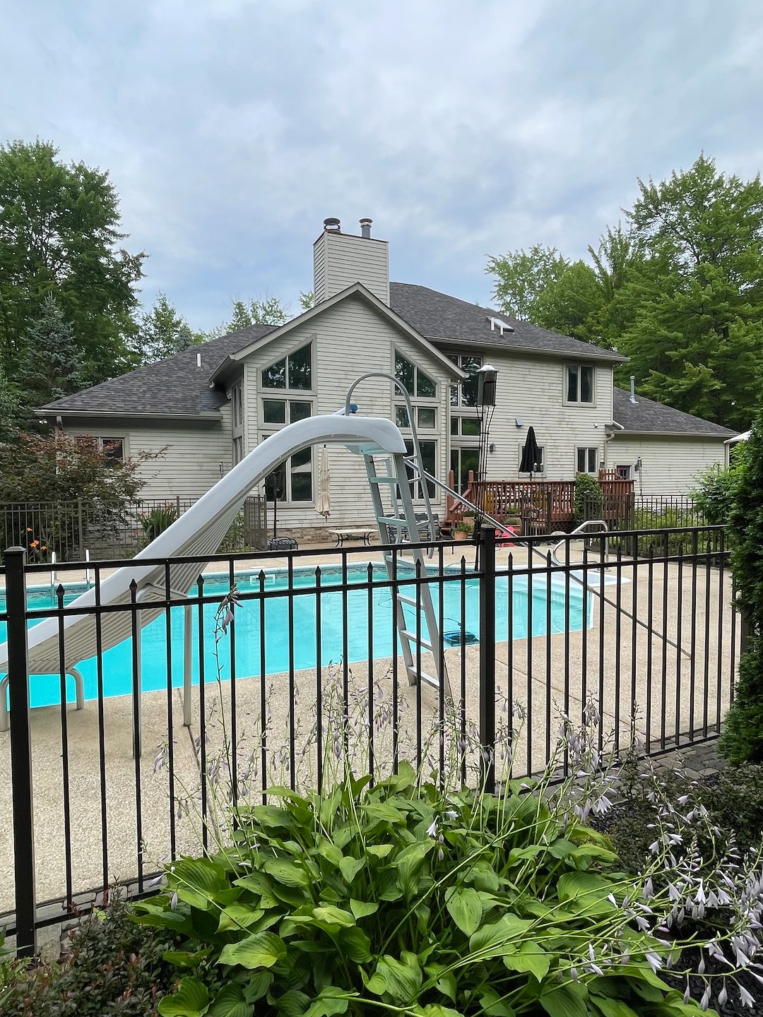 Residential Pressure Washing in Chagrin Falls Ohio Featuring House Washing, Pool Deck Cleaning and Concrete Sealing