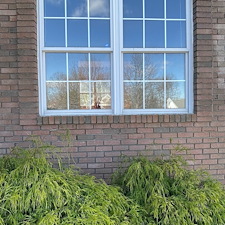 Residential-Pressure-Washing-Removing-Algae-and-Moss-From-Brick-Window-Ledges-on-a-North-Royalton-Home 4