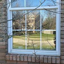 Residential-Pressure-Washing-Removing-Algae-and-Moss-From-Brick-Window-Ledges-on-a-North-Royalton-Home 3