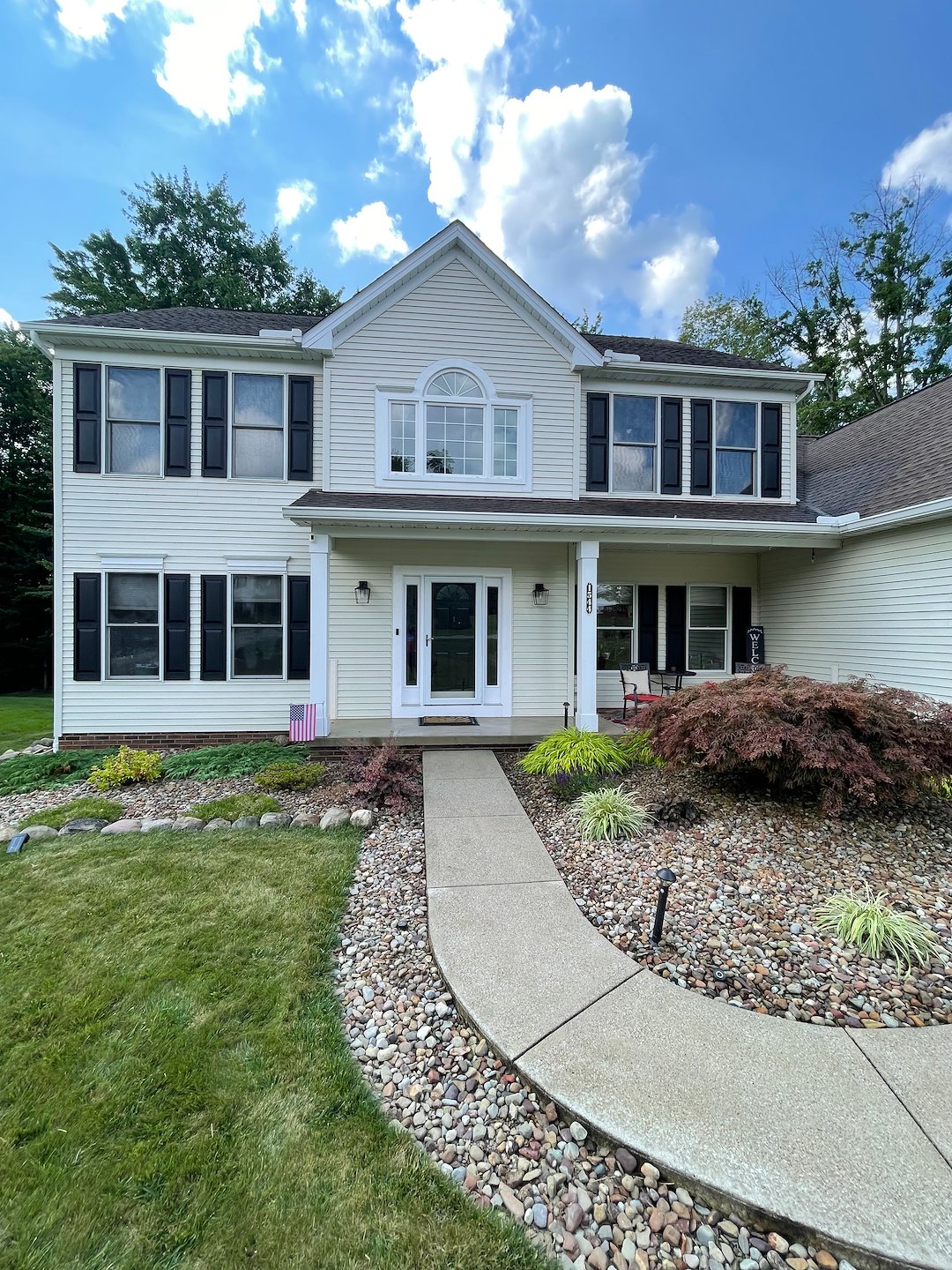 Stop Green Organic Growth Before It Takes Over Your Home With Residential Pressure Washing 
