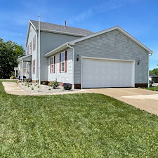 Stow-Residential-Pressure-Washing-for-Green-Siding-and-Black-Concrete-Stains 2