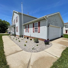 Stow-Residential-Pressure-Washing-for-Green-Siding-and-Black-Concrete-Stains 6